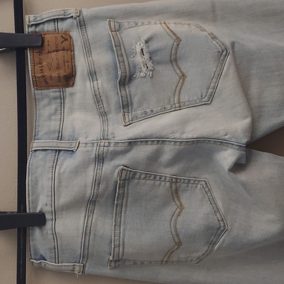 AMERICAN EAGLE OUTFITTERS Extreme Flex Light Blue Wash Distressed Skinny Jeans - Picture 9 of 14